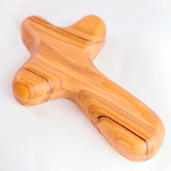 Olive wood Comfort Cross on white background