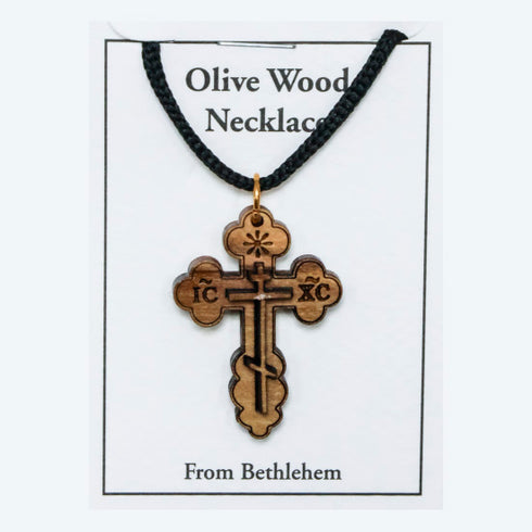 Olive Wood Necklace with cross pendant on a white card, labeled 'From Bethlehem'.