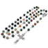 Multicolored beaded rosary with a silver cross on a white background