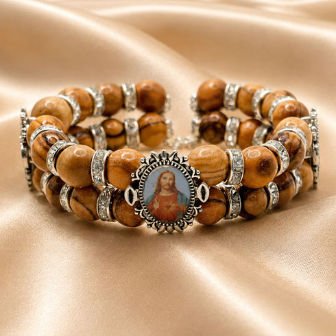 Olive wood beaded bracelet with Sacred Heart of Jesus medal and silver spacers