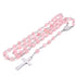 Pink rosary with silver cross on a white background