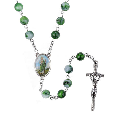 Green rosary with a central oval St. Jude pendant and cross on a white background
