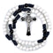 White beaded rosary with blue and black accents and a silver cross on a white background